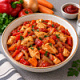 Куриная грудка тушёная с овощами