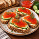 Бутерброды с красной икрой и огурцом