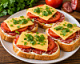 Бутерброды с колбасой, сыром, майонезом, зеленью, помидорами