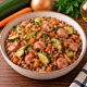 Гречка с овощами и сосисками