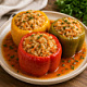 Перец, фаршированный куриным фаршем с рисом