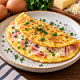 Яичный блинчик с ветчиной и сыром