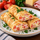 Блинчики с ветчиной, сыром и помидорами